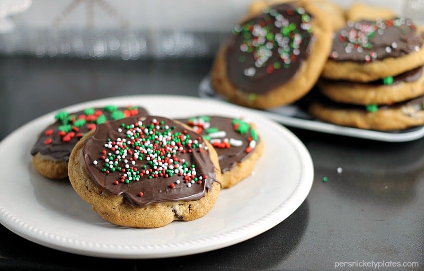 A brown butter chocolate chip cookie slathered with a layer of salted caramel then topped with chocolate and sprinkles. | Persnickety Plates