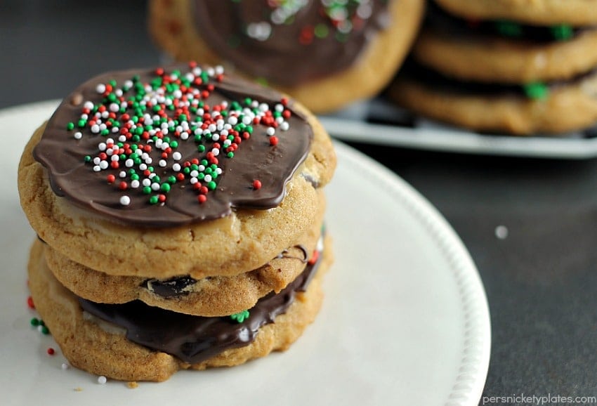 A brown butter chocolate chip cookie slathered with a layer of salted caramel then topped with chocolate and sprinkles. | Persnickety Plates