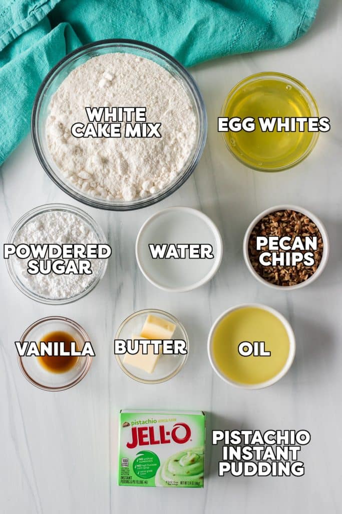 overhead shot of labeled ingredients laid out to make a pistachio pudding cake.