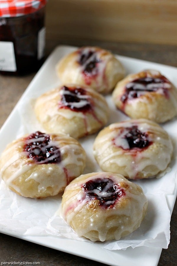 Two ingredients Raspberry Thumbprint Donuts are the perfect breakfast treat. Great to make with your kids! | Persnickety Plates