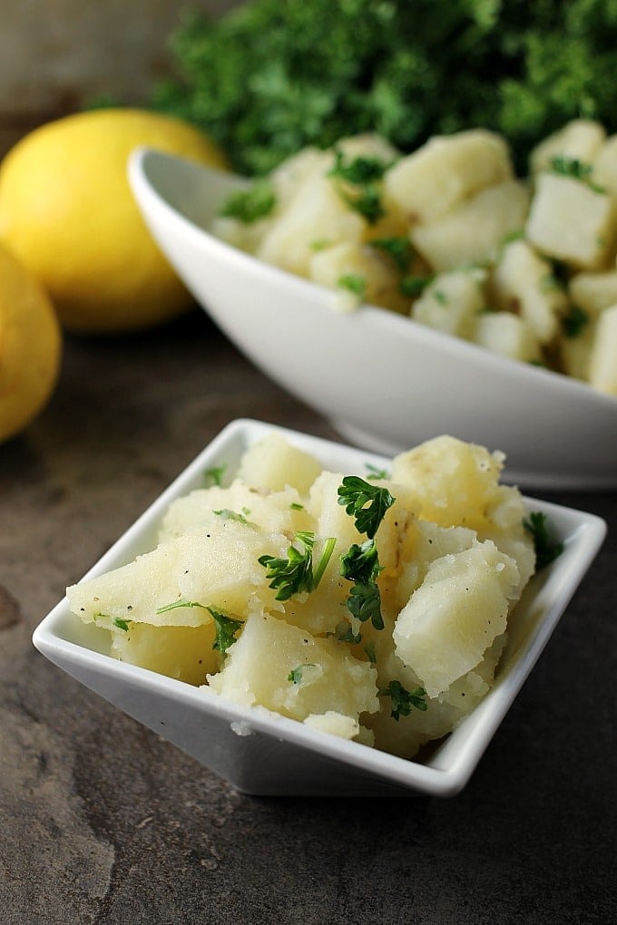 Super simple Arabic Potato Salad only has a few ingredients - potatoes, lemon, oil, garlic, and parsley – but is full of flavor and because there is no mayonnaise, it’s great for a picnic! | Persnickety Plates