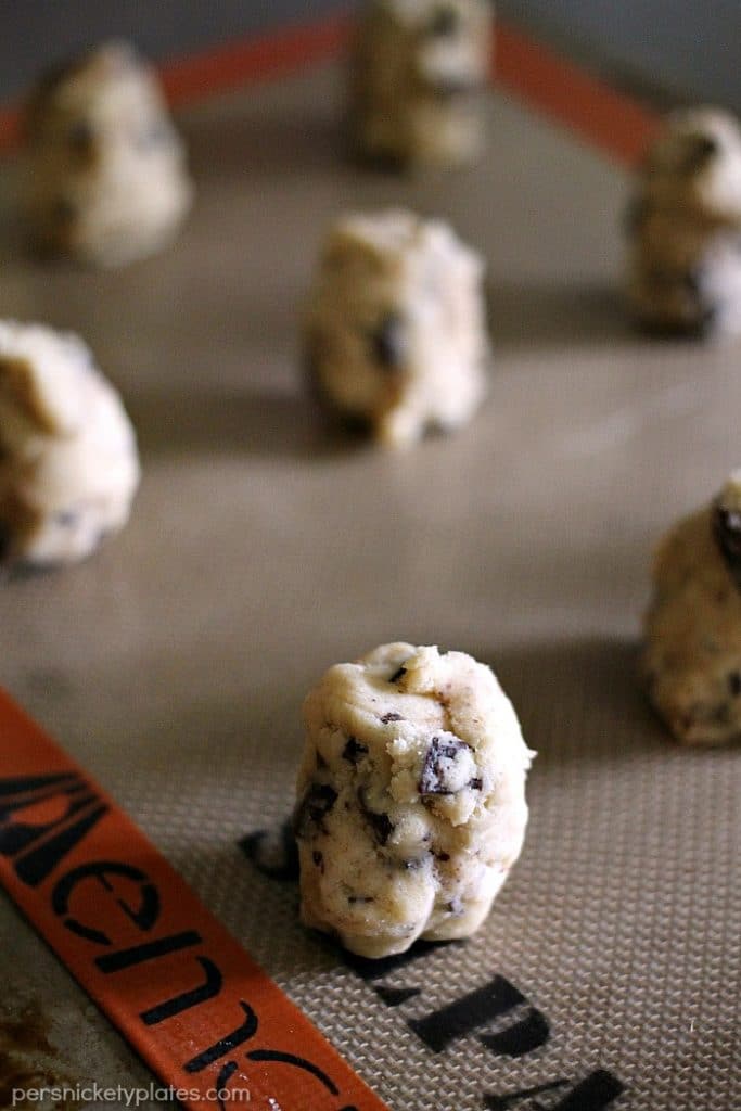 oblong balls of cookie dough on baking sheet