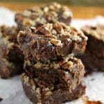 Salted Chocolate Caramel Bars start with a layer of chocolate shortbread, topped with a thick layer of homemade salted caramel, and finished off with toasted pecans. | Persnickety Plates