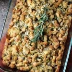 Traditional Herb Stuffing is very easy to make and filled with fresh, flavorful herbs. It'll be a hit on any Thanksgiving table! | www.persnicketyplates.com