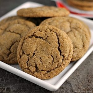 close up of ginger snap cookies on white plate