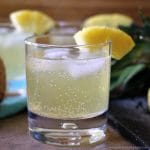 Skinny Pineapple Coconut Cocktail is a fizzy, low calorie drink that is perfect for summertime. | www.persnicketyplates.com