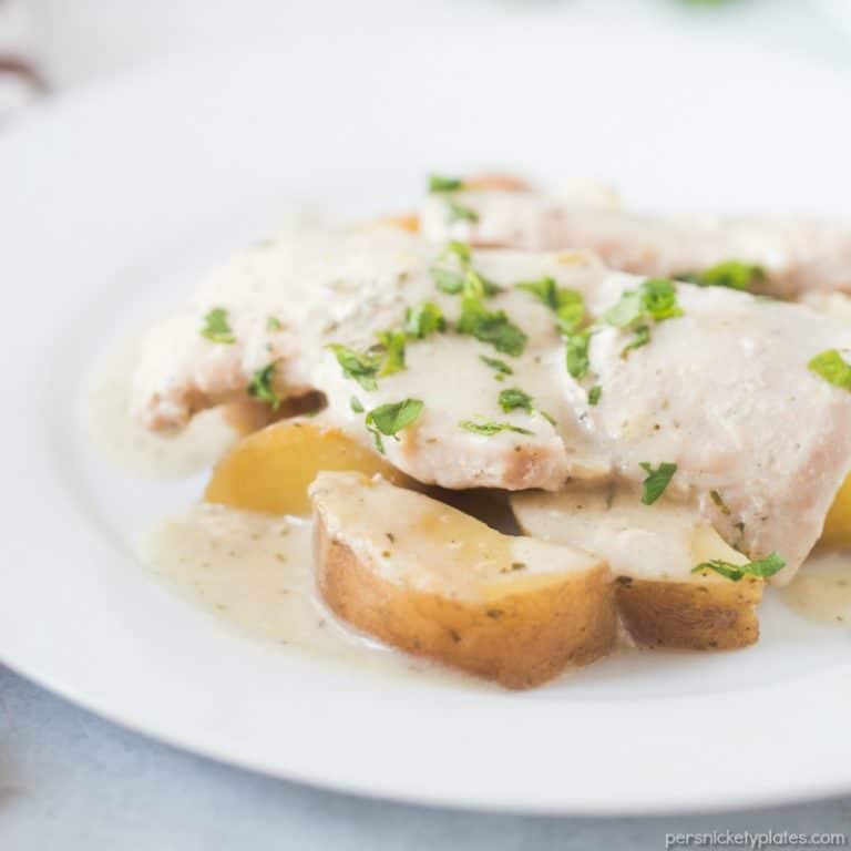 Slow Cooker Creamy Ranch Pork Chops & Potatoes – six ingredients and a full meal right in your slow cooker! | www.persnicketyplates.com