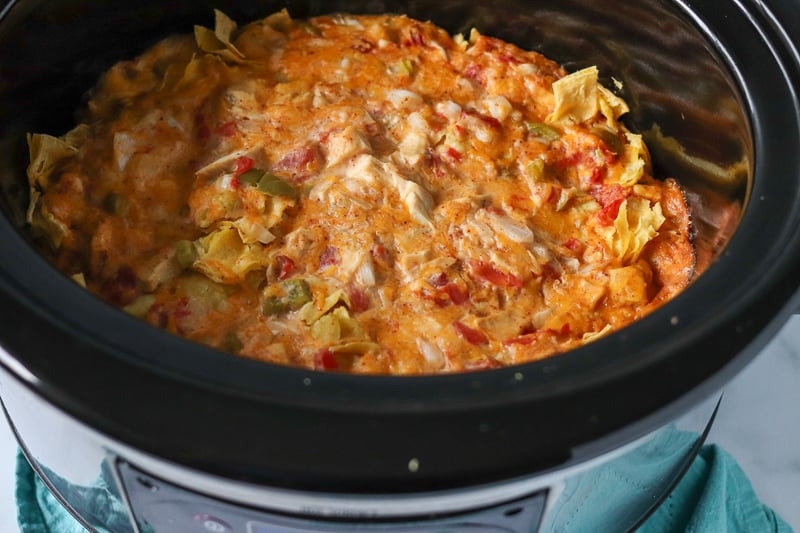 overhead shot of king ranch chicken in crock pot