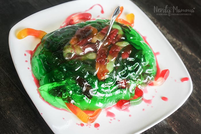 plate full of jell-o in brain shape with gummi worms
