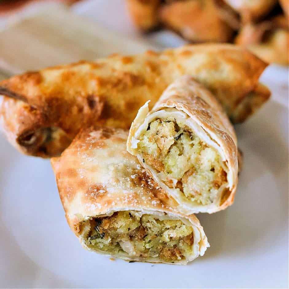 thanksgiving egg roll cut in half showing the turkey & stuffing.