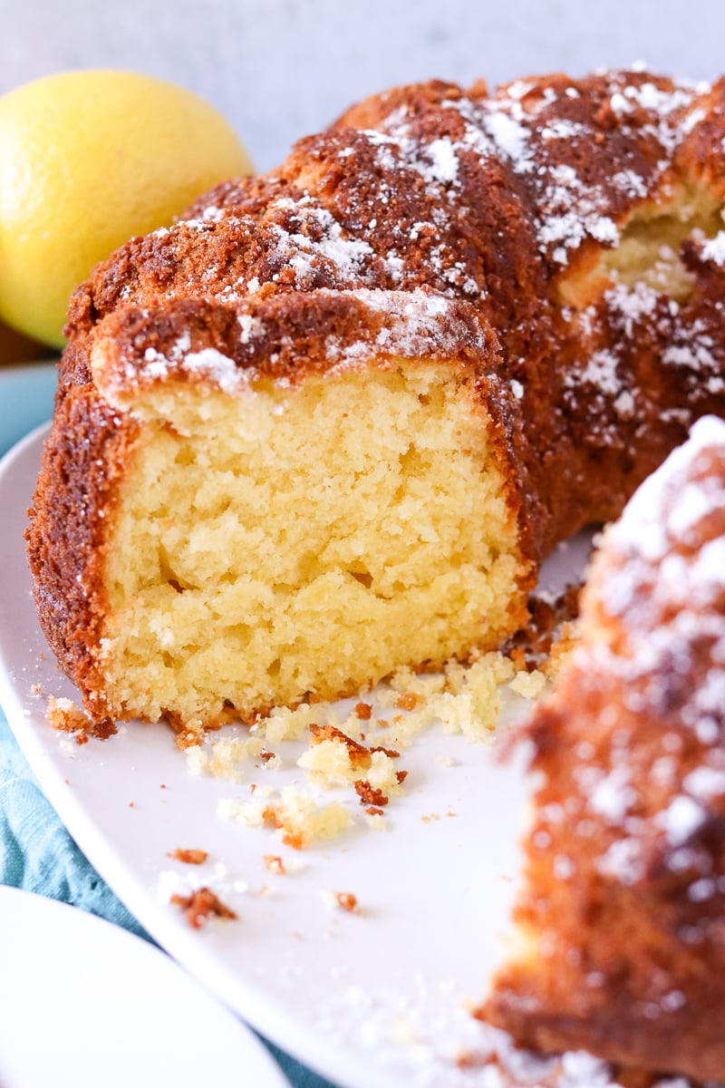 lemon bundt cake with a slice taken out