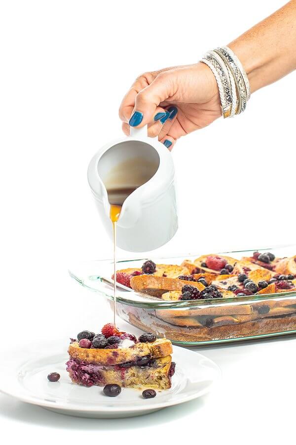 maple syrup being poured onto french toast