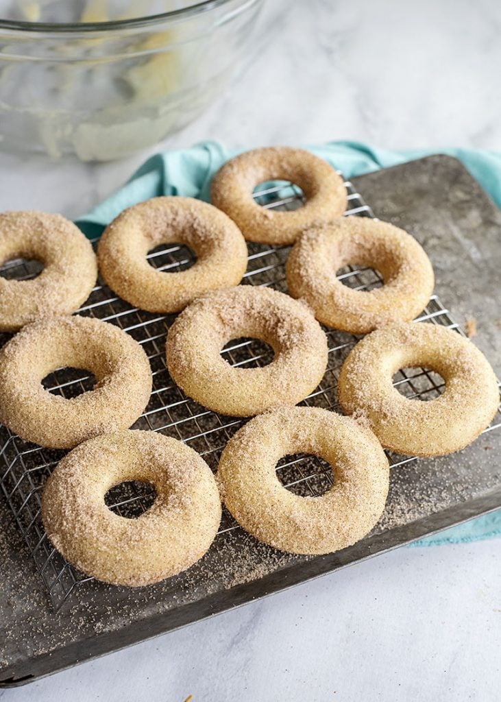 cinnamon sugar donuts on cooling rack