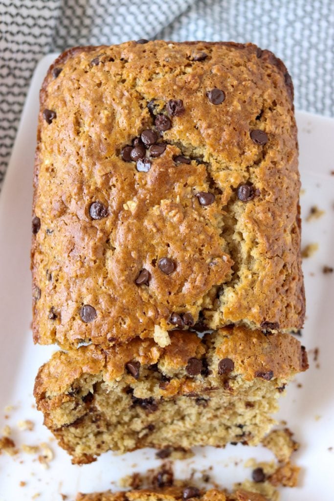 overhead shot of sliced quick bread topped with chocolate chips