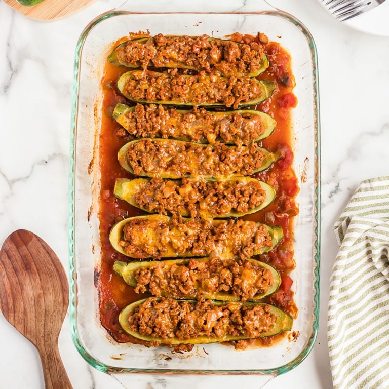 overhead shot of zucchini boats in baking dish
