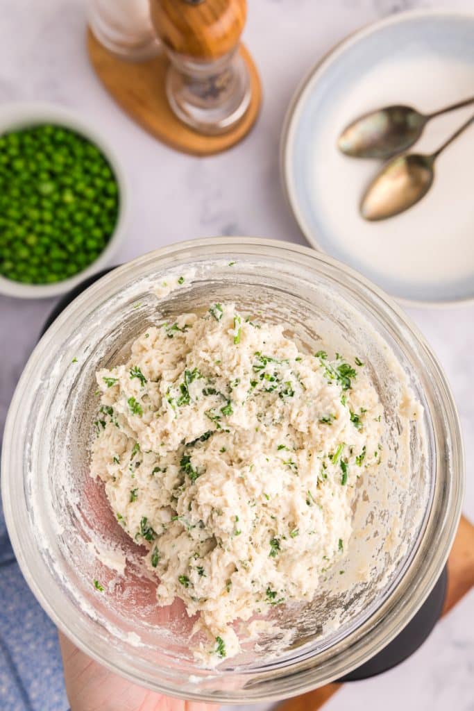 biscuit dough in a mixing bowl for dumplings.