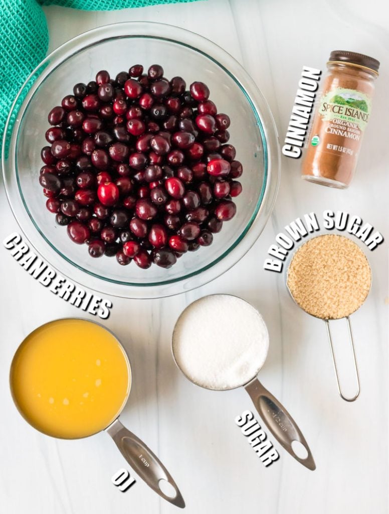bowl of cranberries and ingredients to make sauce