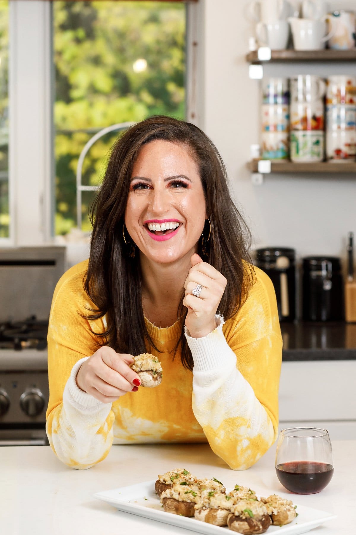 Liz eating crab stuffed mushrooms