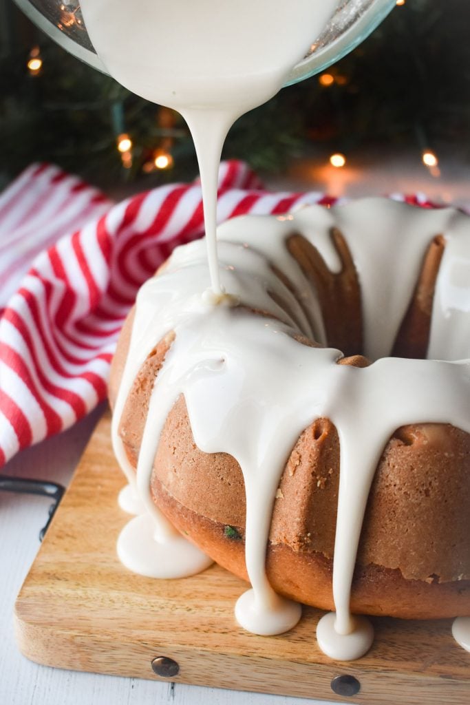 icing pouring over a bundt cake