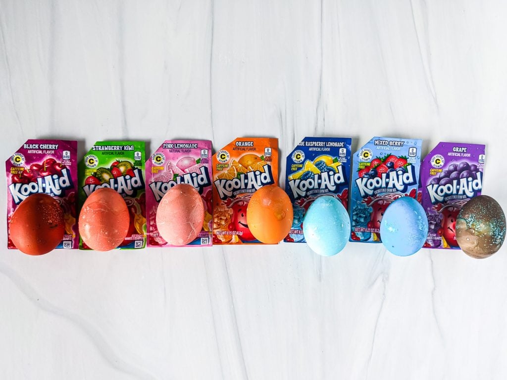 row of rainbow eggs with kool-aid packets
