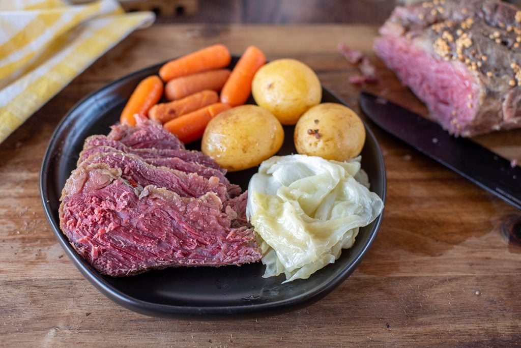 plate of corned beef, cabbage, potatoes, and carrots