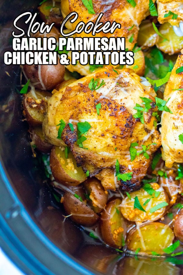 close up of garlic parmesan chicken in slow cooker with text reading "slow cooker garlic parmesan chicken & potatoes"
