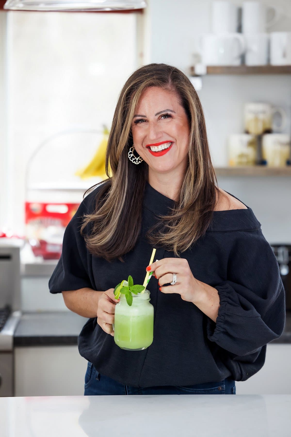 Liz Sipping Cucumber Lemonade Slushie