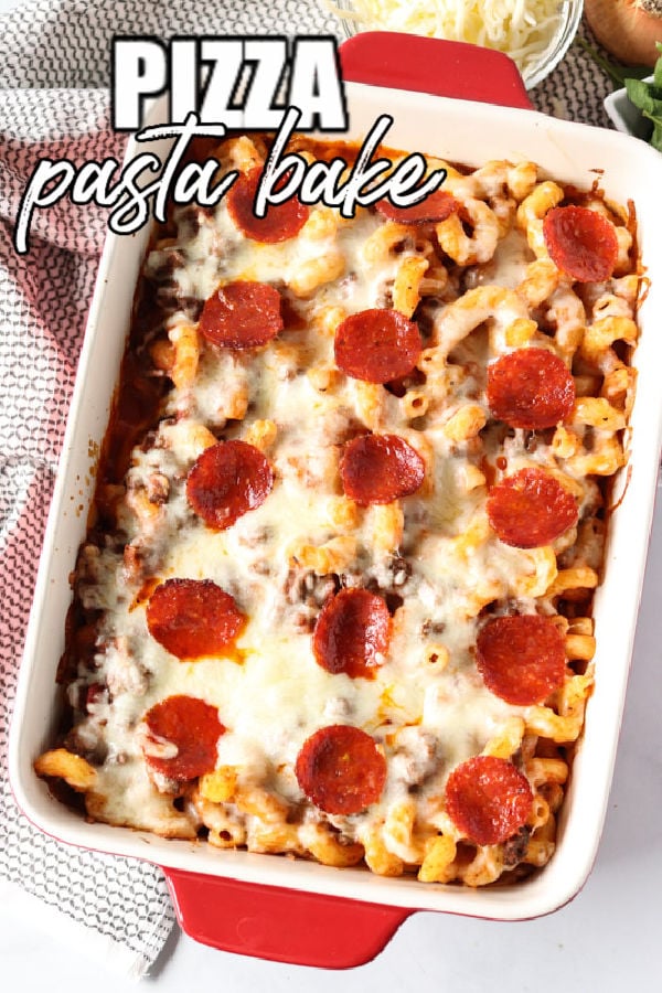 overhead shot of pizza pasta topped with pepperoni in a baking dish