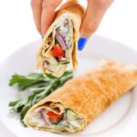 Person holding Lebanese salad wraps