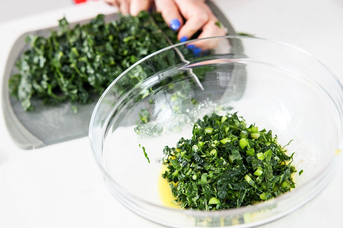 adding kale to salad ingredients