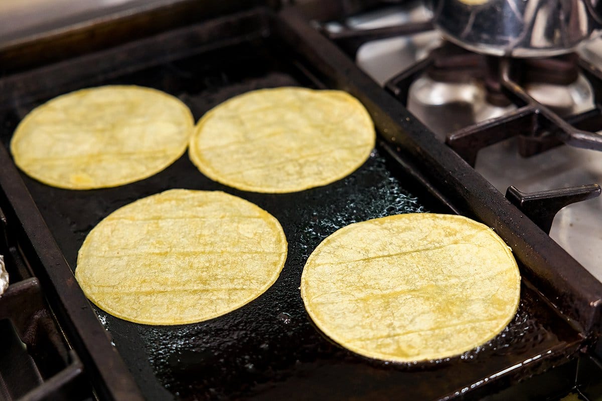 tortillas on griddle