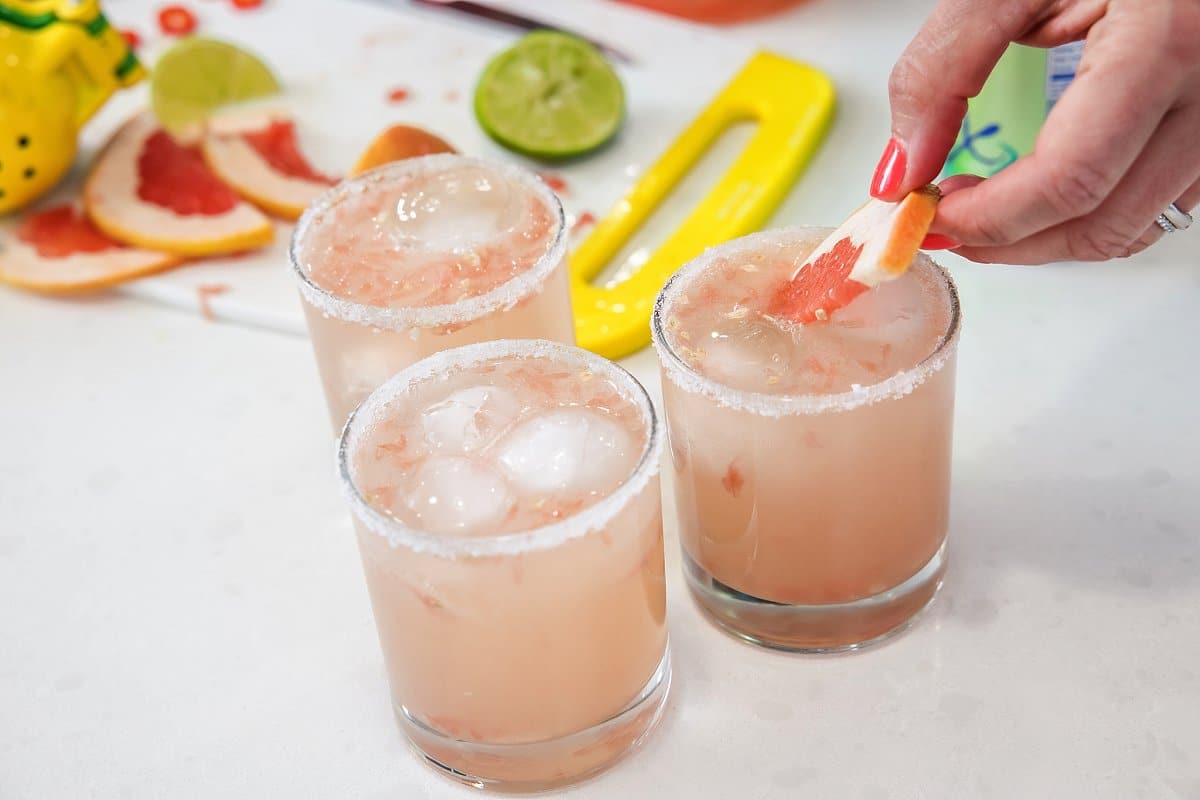 Adding garnish to paloma