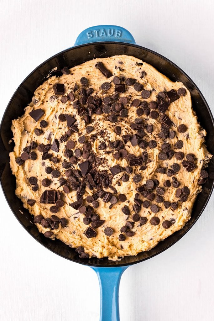 overhead shot of raw cookie dough in a skillet