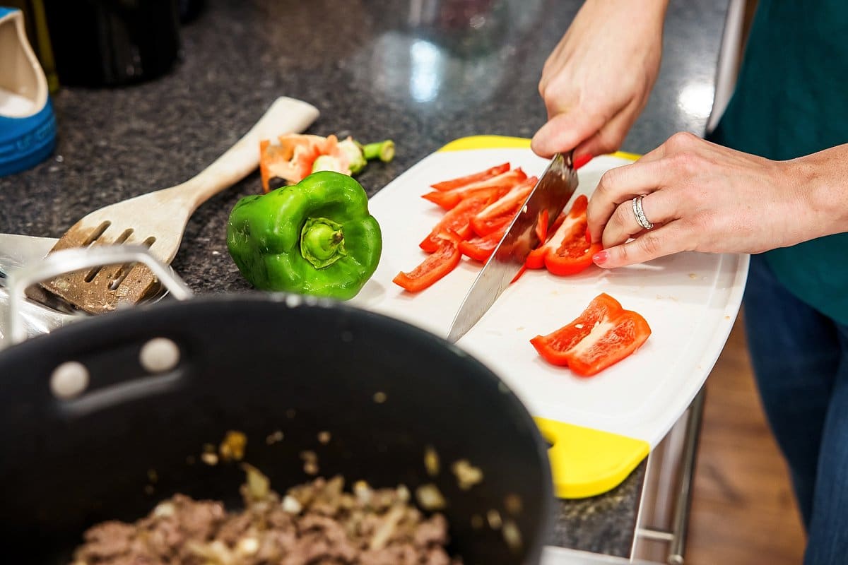 chopping bell peppers