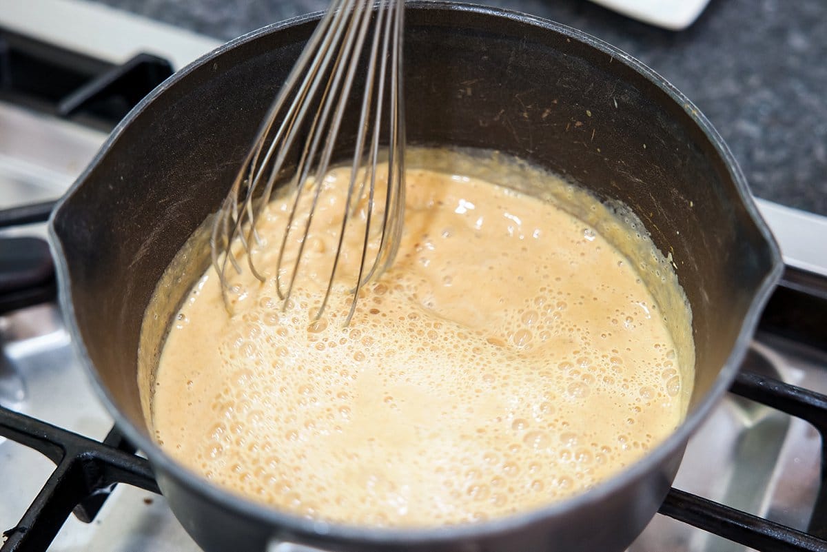 Whisking pumpkin oatmeal starter