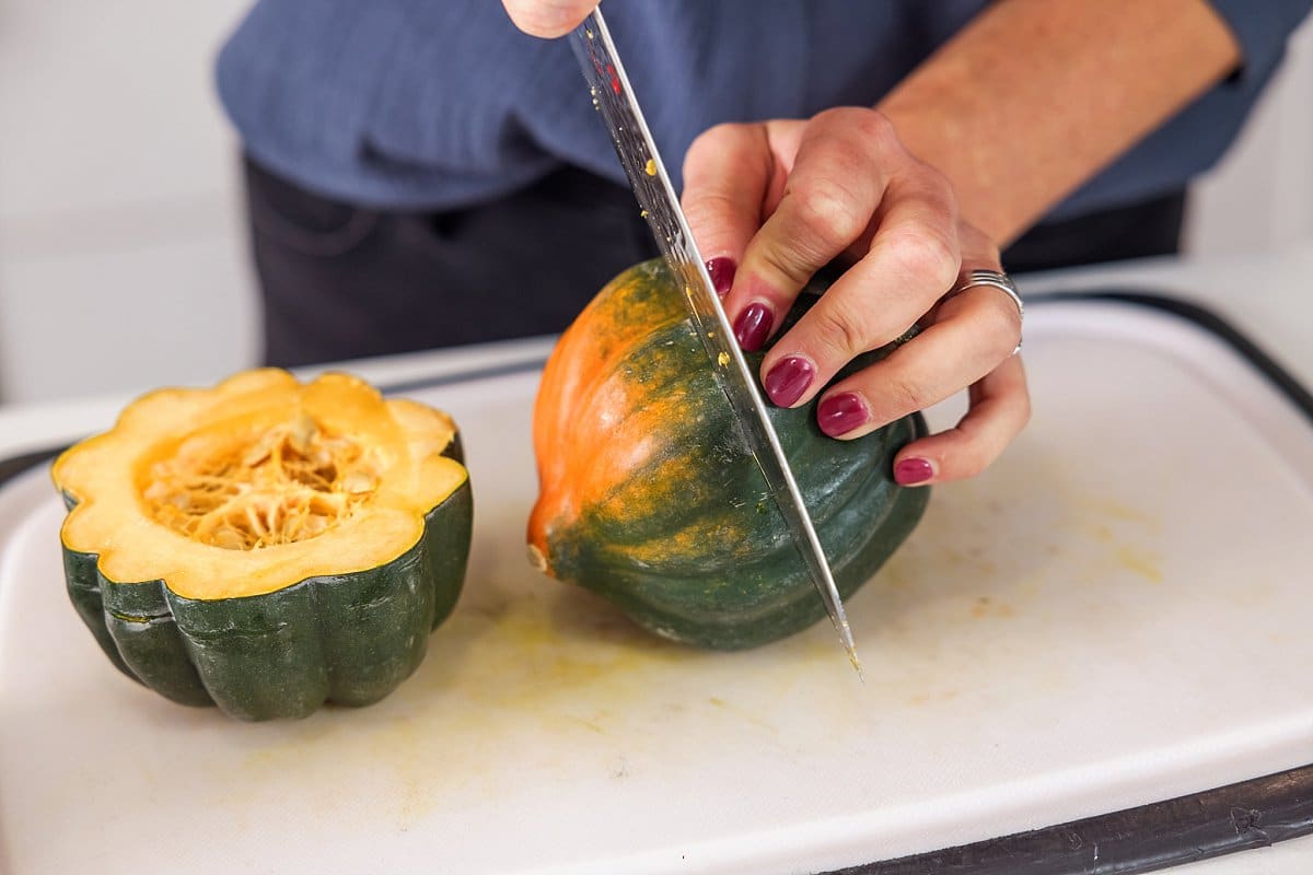 cutting an acorn squash