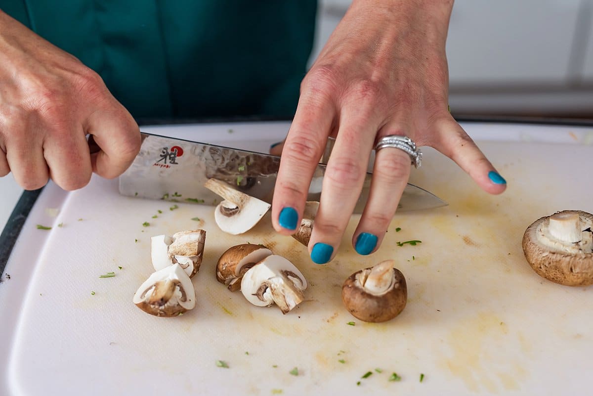 Liz cutting mushrooms for soup.