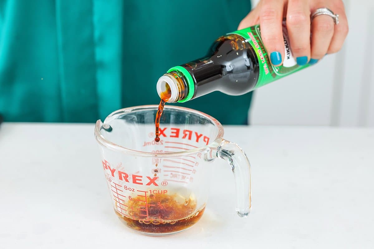 sesame oil added to a measuring cup