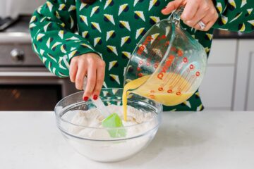 adding egg to a flour mixture