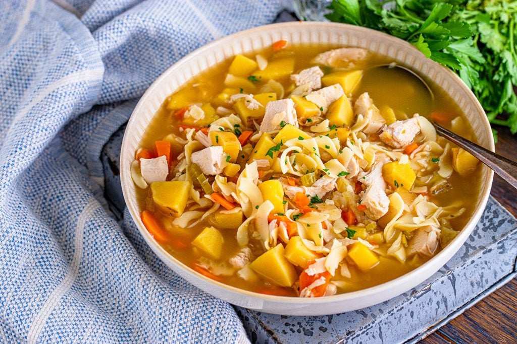large bowl of leftover turkey noodle soup