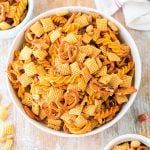 white bowl full of cajun chex mix