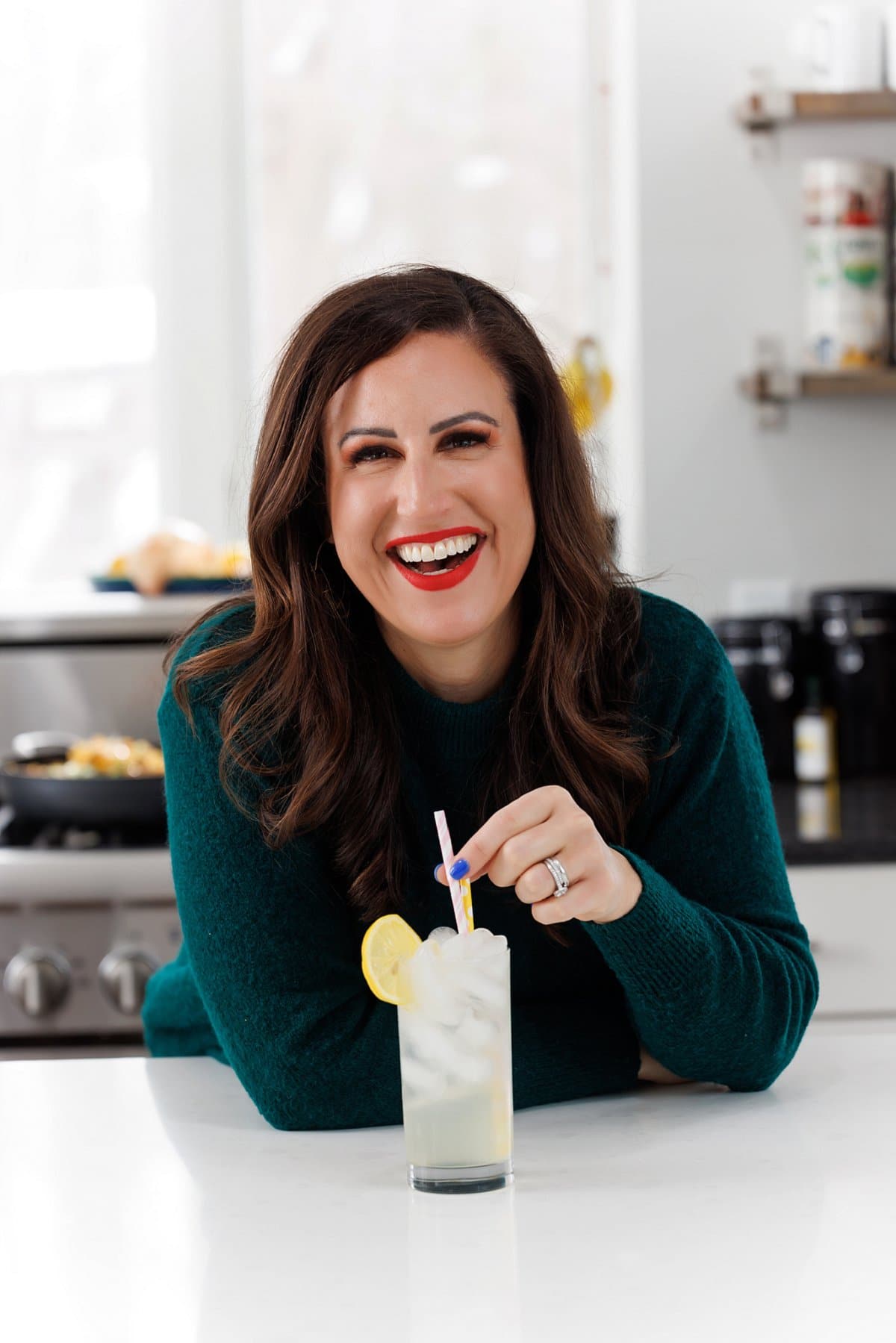 Liz drinking sparkling orange blossom water lemonade.