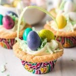 easter basket cookie cup filled with colorful M&Ms.