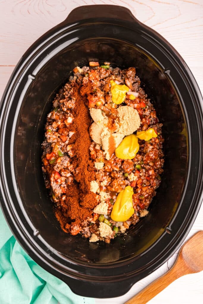 overhead shot of slow cooker with sloppy joe ingredients.