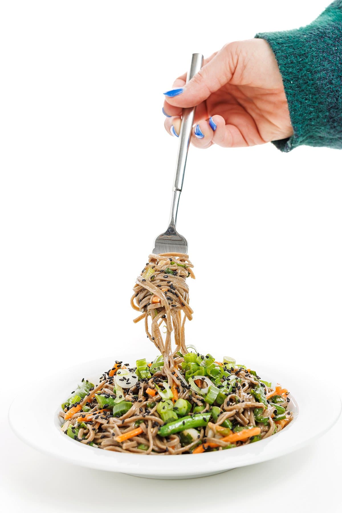 Forkful of soba noodle salad.