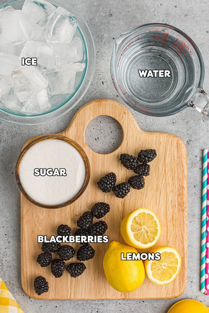 overhead shot of ingredients laid out to make blackberry lemonade.