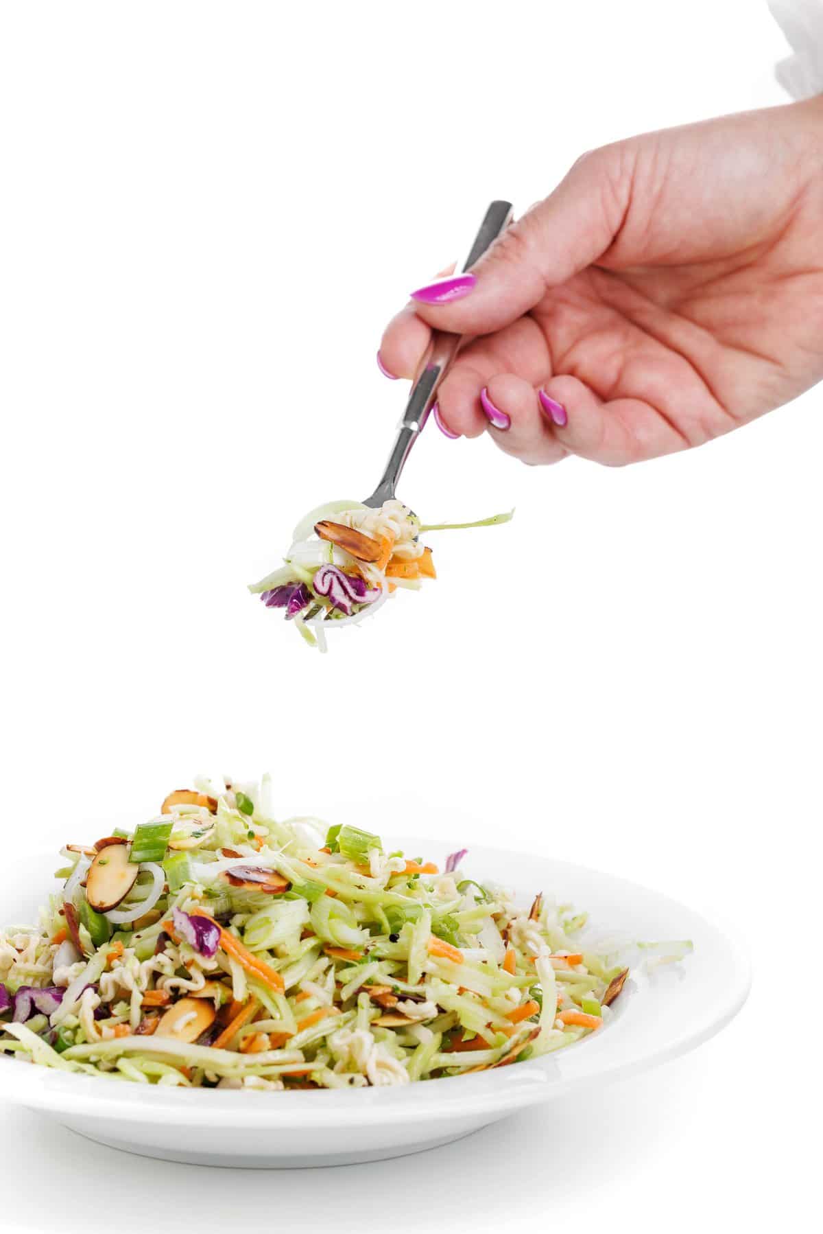 Forkful of ramen broccoli slaw.