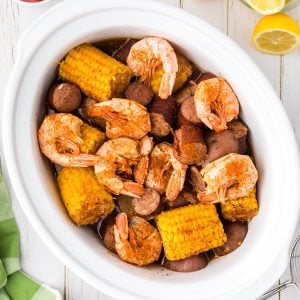 overhead shot of a shrimp boil in a crockpot.