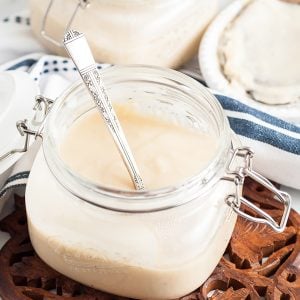 homemade cream of chicken soup in a glass jar with locking lid.