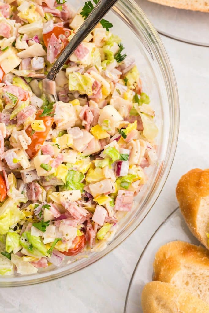 overhead shot of hoagie dip in a glass bowl.